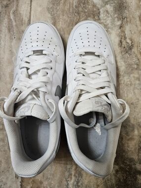 Nike White Low-Top Leather Sneakers with Gray Swoosh